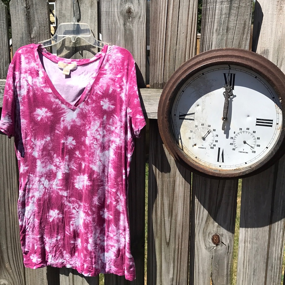 Pink tie dyed t-shirt.